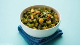 Stir fried Bhindi with peanuts recipe in white plate