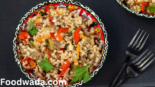 Brown rice salad 1 healthy recipe in a bowl black background