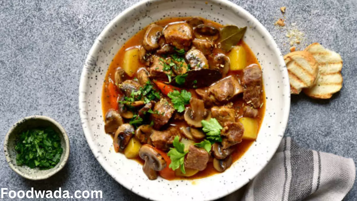 Mushroom bourguignon recipe in white bowl